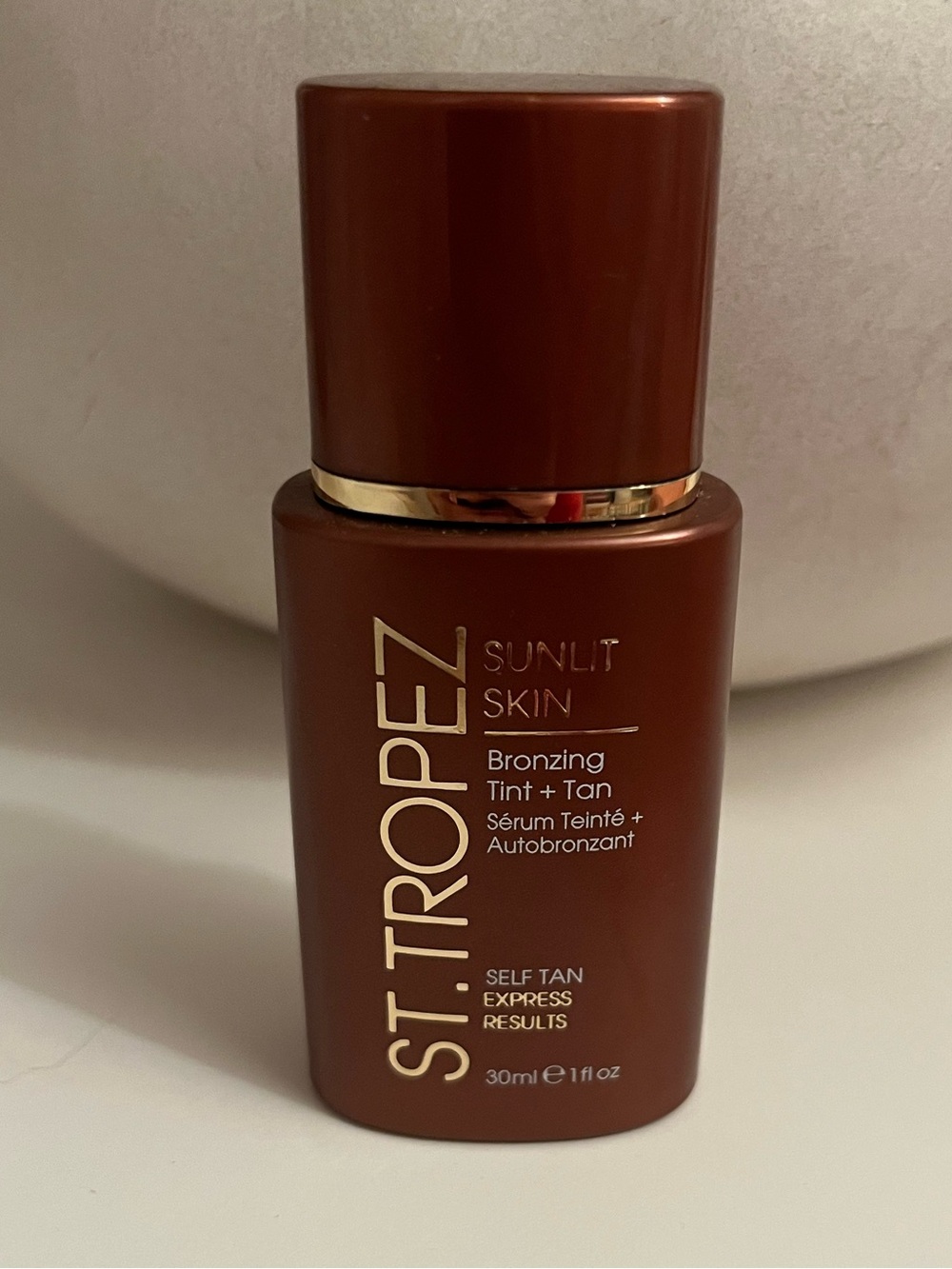 St. Tropez Sunlit Skin Bronzing Tint + Tan